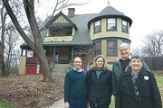 Architectural conservator Peter Wollenberg (from left); Ruth Keenoy, architectural preservationist with Landmarks Association of Saint Louis; preservation historian Esley Hamilton; and JoEllen McDonald, archivist with the Richmond Heights Historical Society, stand in front of one of Richmond Heights’ century homes on Silverton Place. The home is owned by Lisa and John Klorer.       Photo by Diana LinsleyLinsley